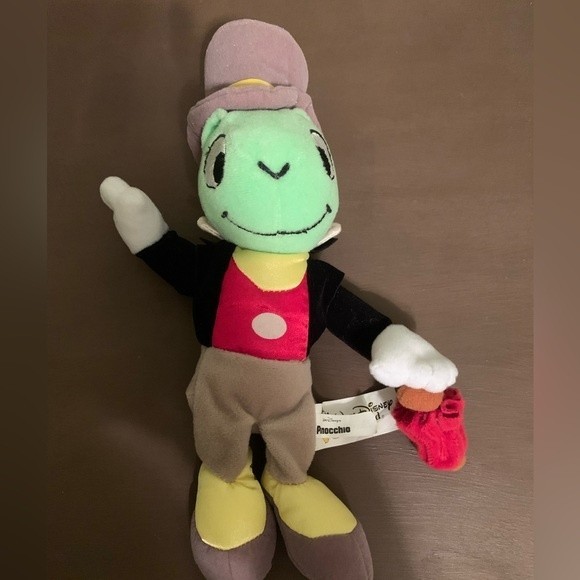 Pinocchio lot of VHS, book and Jiminy Cricket stuffed animal - Picture 2 of 5